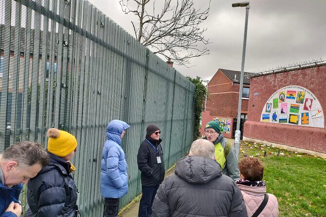 Belfast Troubles Tour: Walls and Bridges - International Mural Wall on Divis Street: art with political memory
