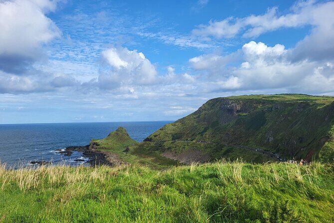 Five Star Giant's Causeway & Belfast Luxury Private Excursion. - Belfast city stops: murals, Peace Walls, and the Titanic connection