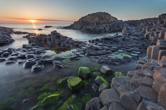 Giants Causeway, Rope Bridge, Carrickfergus Castle and Dark Hedges Tour - The Antrim Coast Road drive: sea on one side, glens on the other