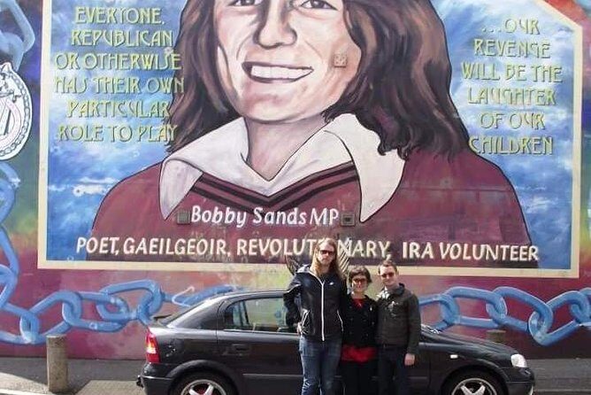 Official World Famous Belfast Taxi Tour ™ - Back toward the Falls Road area: Bobby Sands, Divis Tower, and St Peter’s