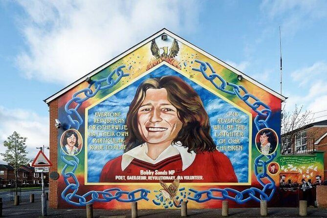 Political Taxi Tour Belfast (1-7 People) - The Peace Wall sign again: same place, new context