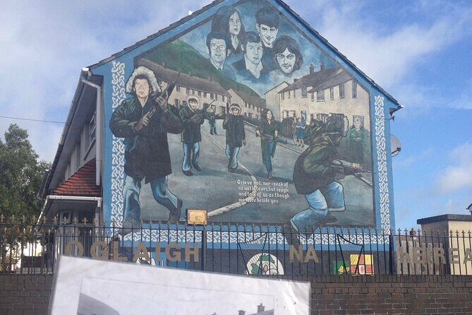The Troubles and iconic award winning taxi 2hr private cab tour - Stop 6: International Mural Wall on Divis Street